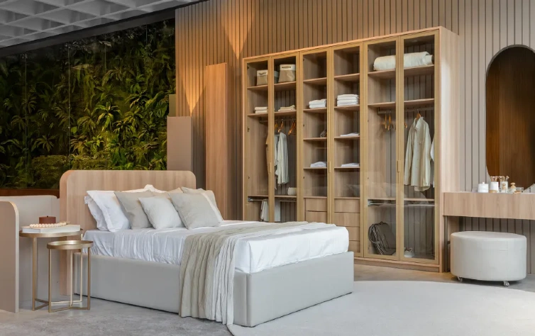 O uso de curvas no mobiliário planejado valoriza o espaço e transforma o ambiente em um refúgio sofisticado. Créditos: Roberta Gewehr